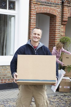 Local home moving service in Twickenham with packed boxes and moving van