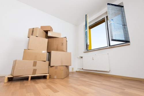 Office furniture and boxes organised for a workplace relocation in Twickenham