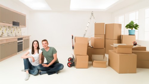 Local moving truck loading furniture in Twickenham