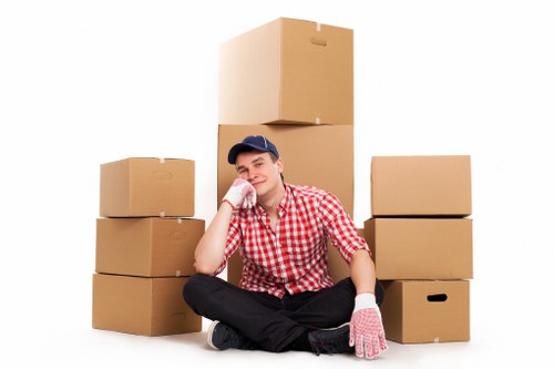 Office relocation setup with boxes and equipment in Twickenham